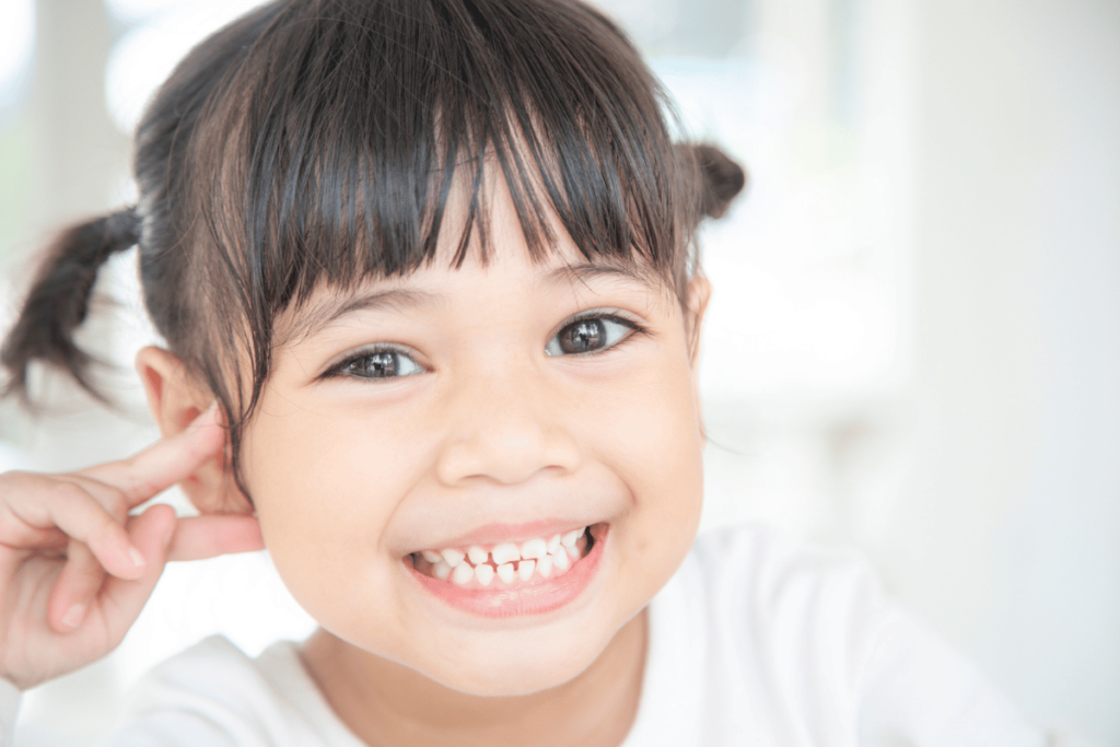 little girl smiling