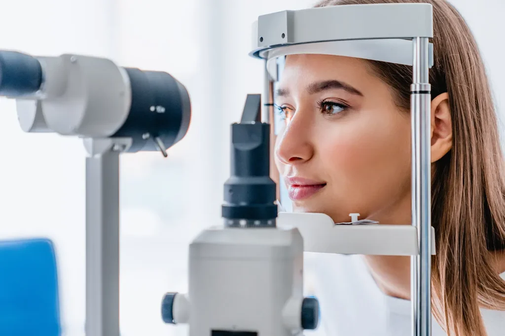 a young woman getting an eye exam